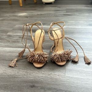 Nude fringe heels